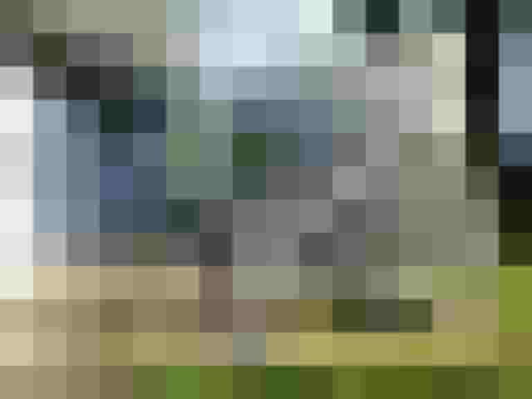 Überdachte Fahrradabstellanlage in Salzburg, förderfähig durch Anschlussförderung.