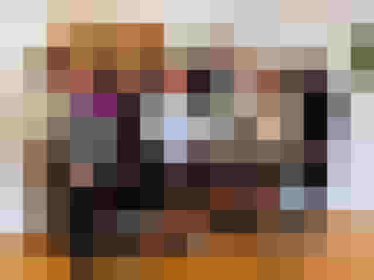 Gruppenfoto beim Treffen „Wer radelt gewinnt“ mit einem orangefarbenen Fahrrad.