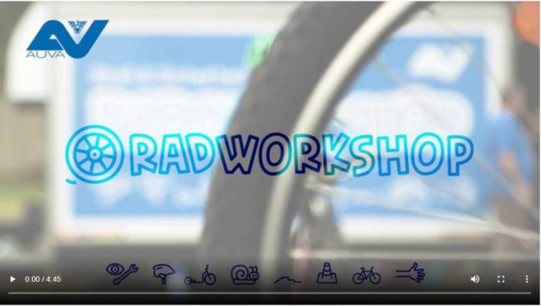 Radworkshop-Logo mit Fahrradreifen im Vordergrund, Fokus auf Verkehrssicherheit und Mobilität.