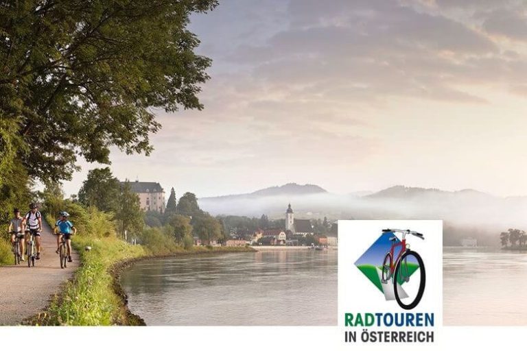 Fahrradfahrer am Flussufer, idyllische Landschaft in Österreich, perfekte Radtouren.