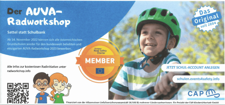 AUVA-Radworkshop: Kinder in Helmen und Radtrikots lernen Sicherheit im Verkehr.