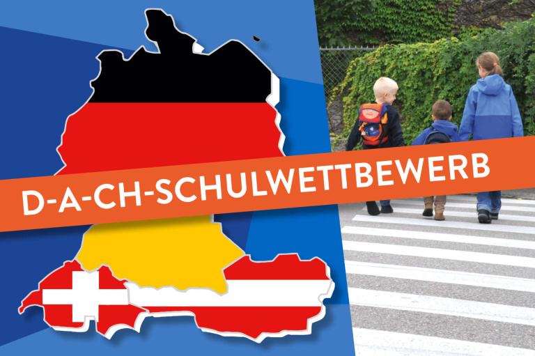 D-A-CH-Schulwettbewerb für kreative Kindersicherheitsideen mit Kindern auf dem Zebrastreifen.